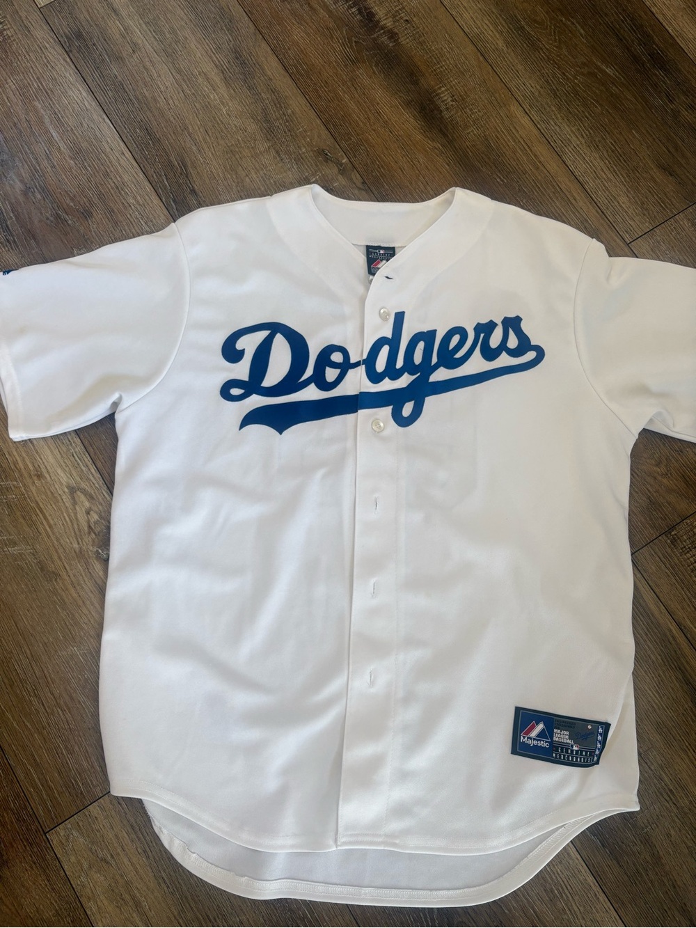 Majestic White Jersey Tag Detail with Blue Stitching